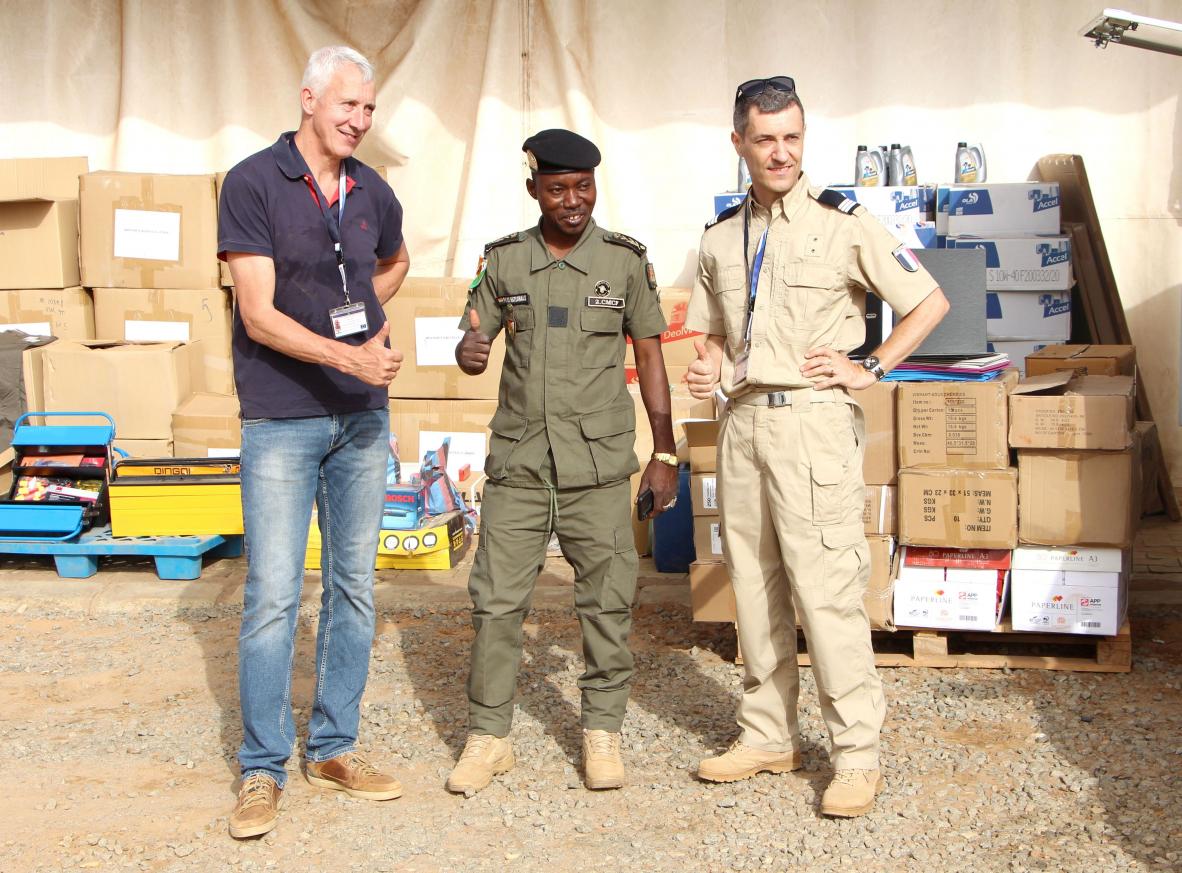 Alexander BRAKER (left) handing over materials in the HQ to Commissioner Haro