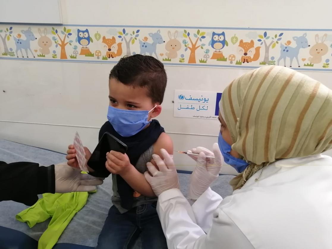 Nurse examining a child