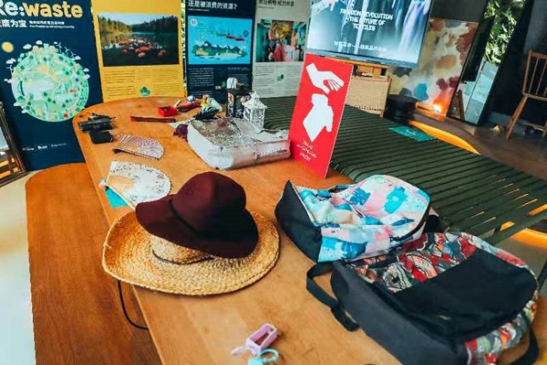 Hats and backpacks on a table