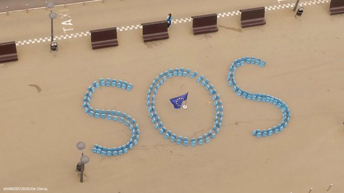 "SOS" letters in the ground