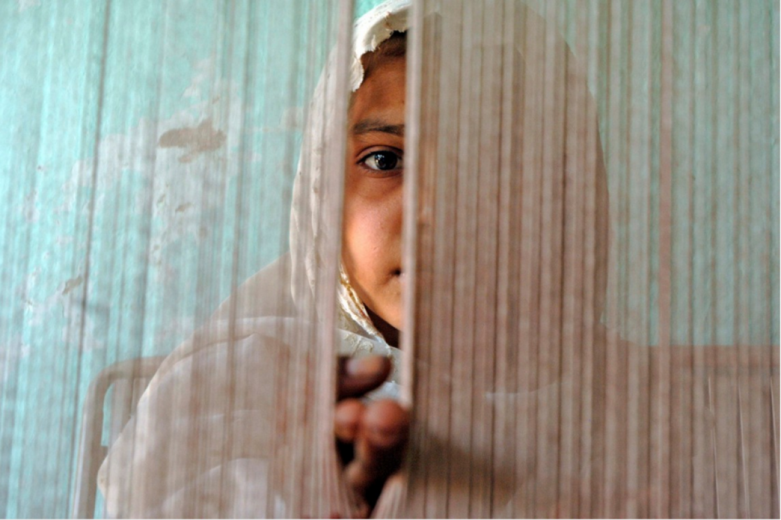 Girl behind a curtain