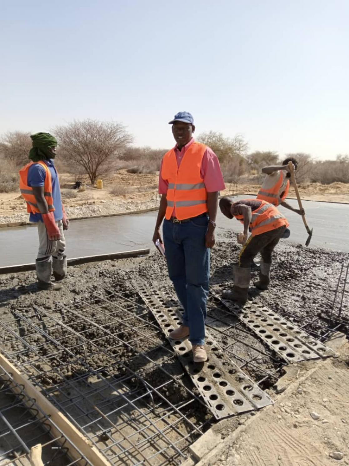 Group of people working in a construction site