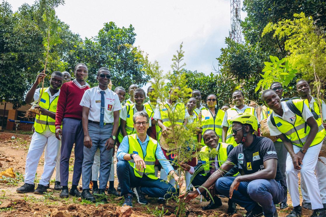 Fruits of labour: EU Ambassador and students of Kololo Senior Secondary School