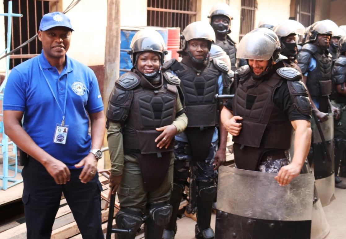 Prison staff training in use of riot control equipment. 