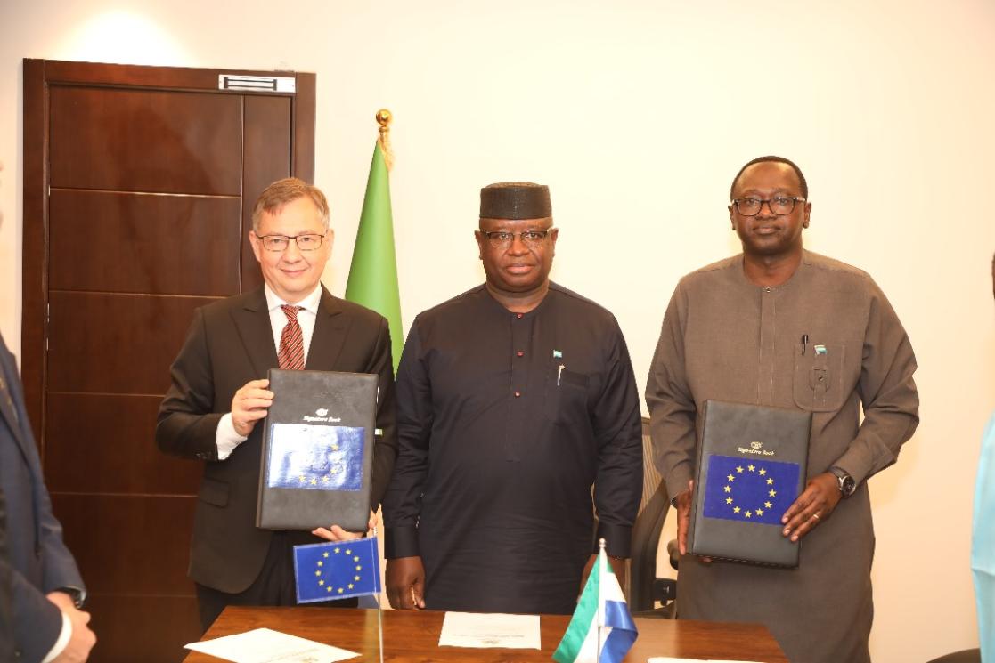 (L-R EU Ambassador Jacek Jankowski, President Julius Bio and Sheku Bangura, Minister of Finance 