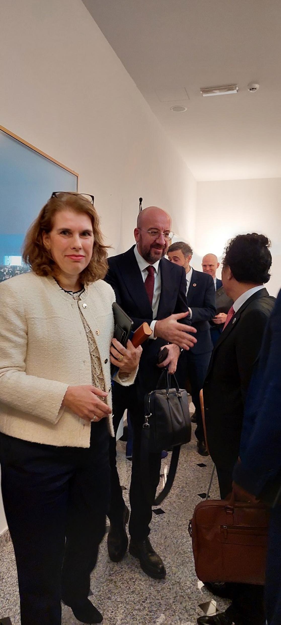 Alexandra Valkenburg (HOD) and Charles Michel leaving the meeting room