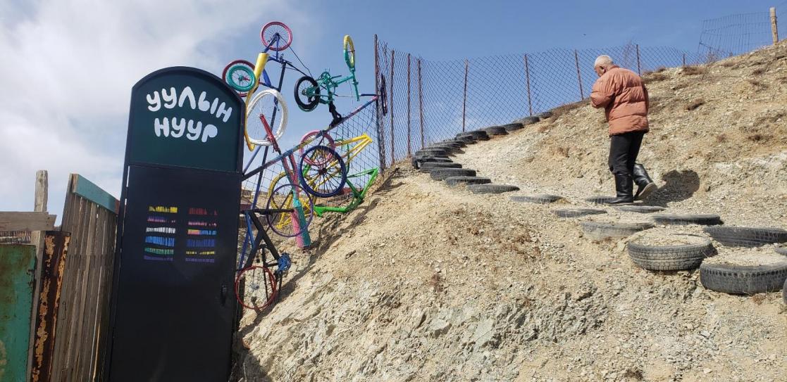 Man walking up a small hill