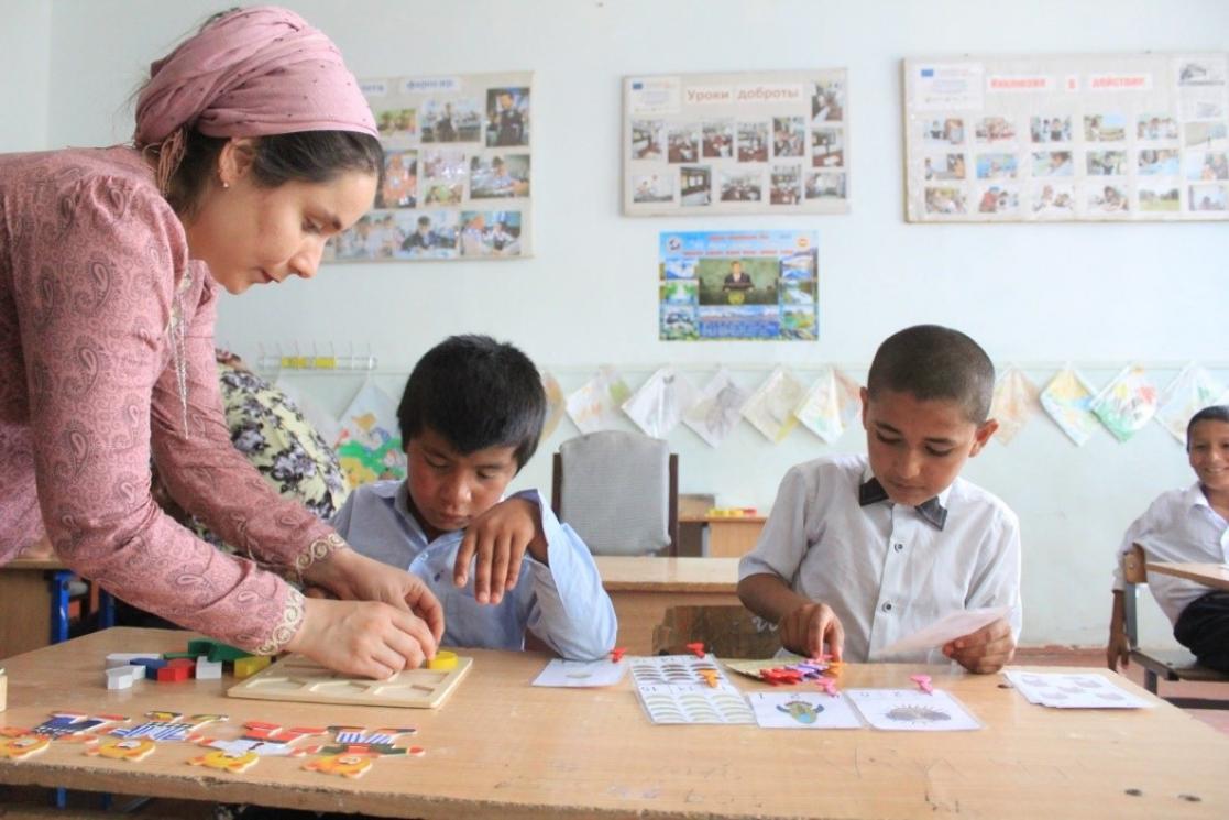 Two children at school playing games