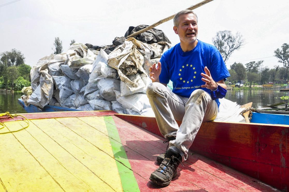 Man explaining something in a boat