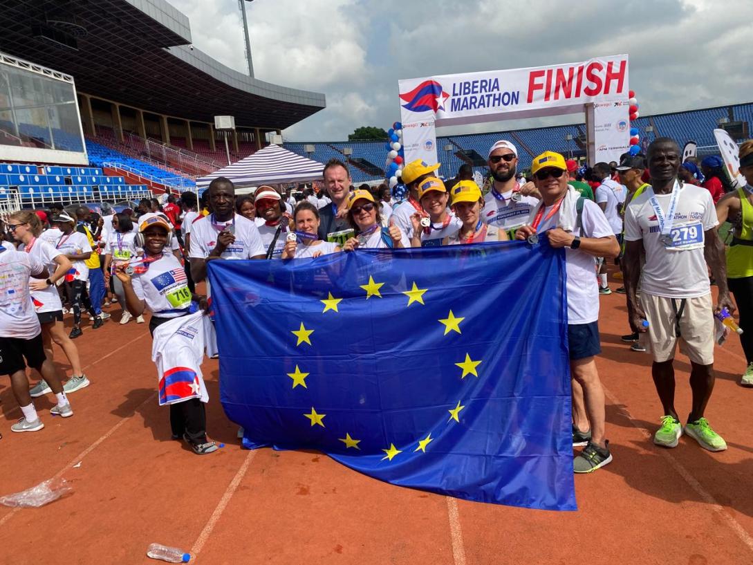 Group of people showing the EU flag