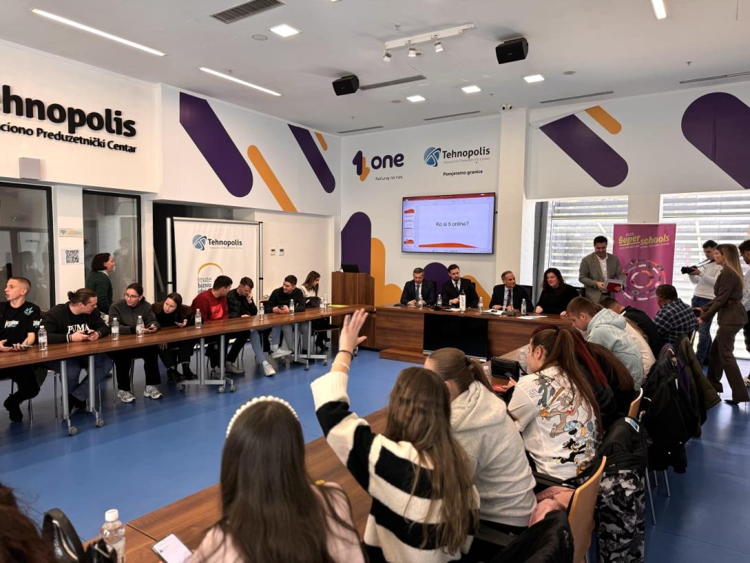 pupils sitting in a large room