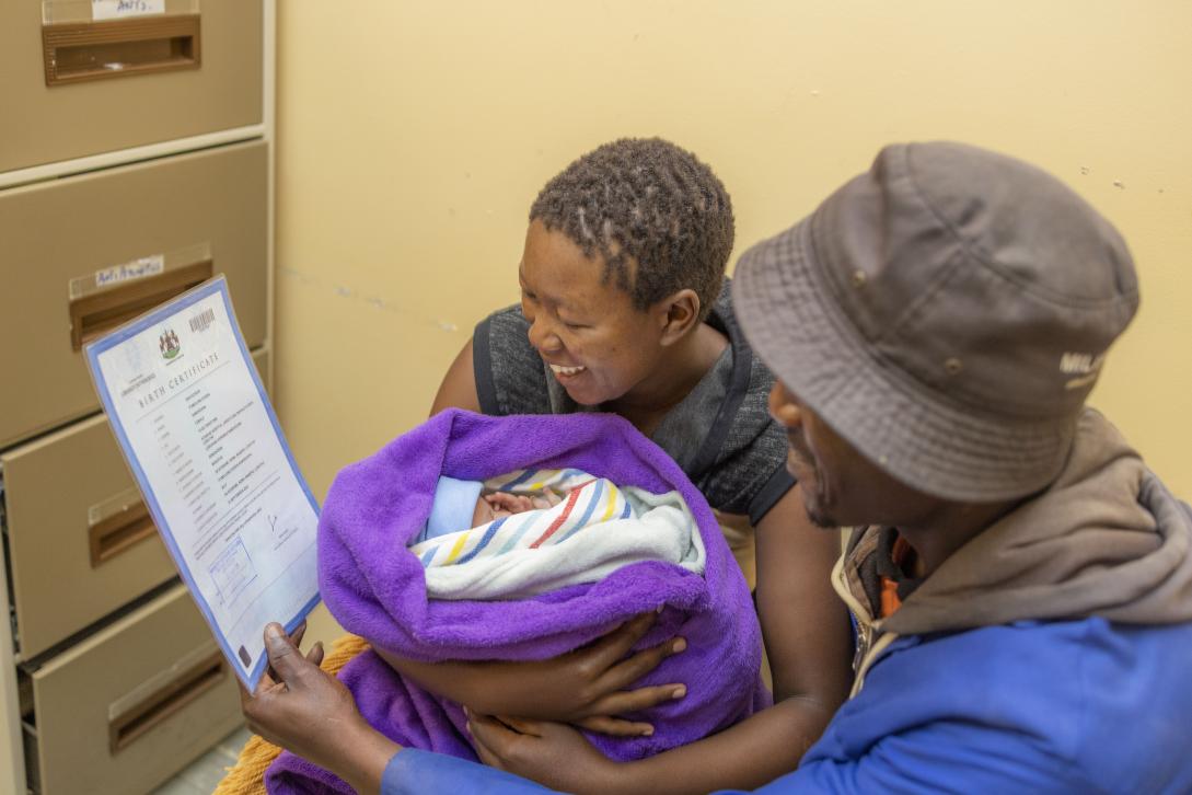 New parents rejoice as they receive their child birth certificate