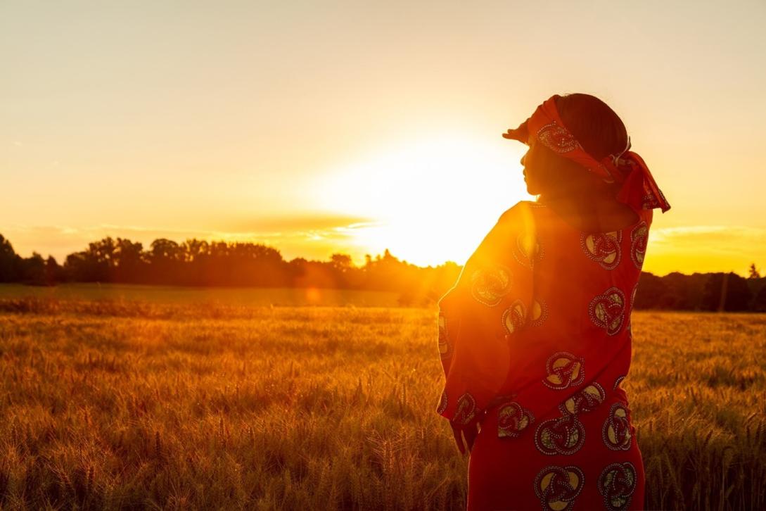 Woman looking at the sun