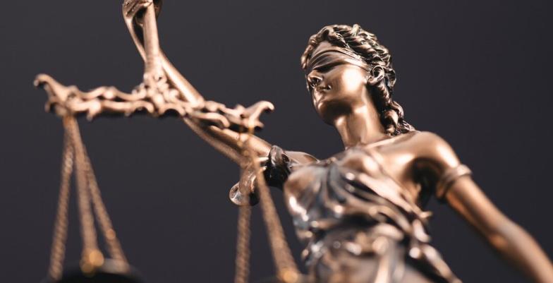 A close up of Lady Justice statue. 